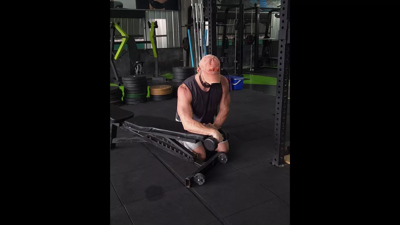 Reverse-Grip Dumbbell Wrist Curl exercise